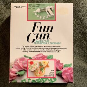 Hutzler Gerda Fun Gun for decorating cakes, cookies, etc.  Has 5 of 6 nozzles.